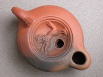 Lampe à huile gallo romaine, décor de Lion, origine Montans